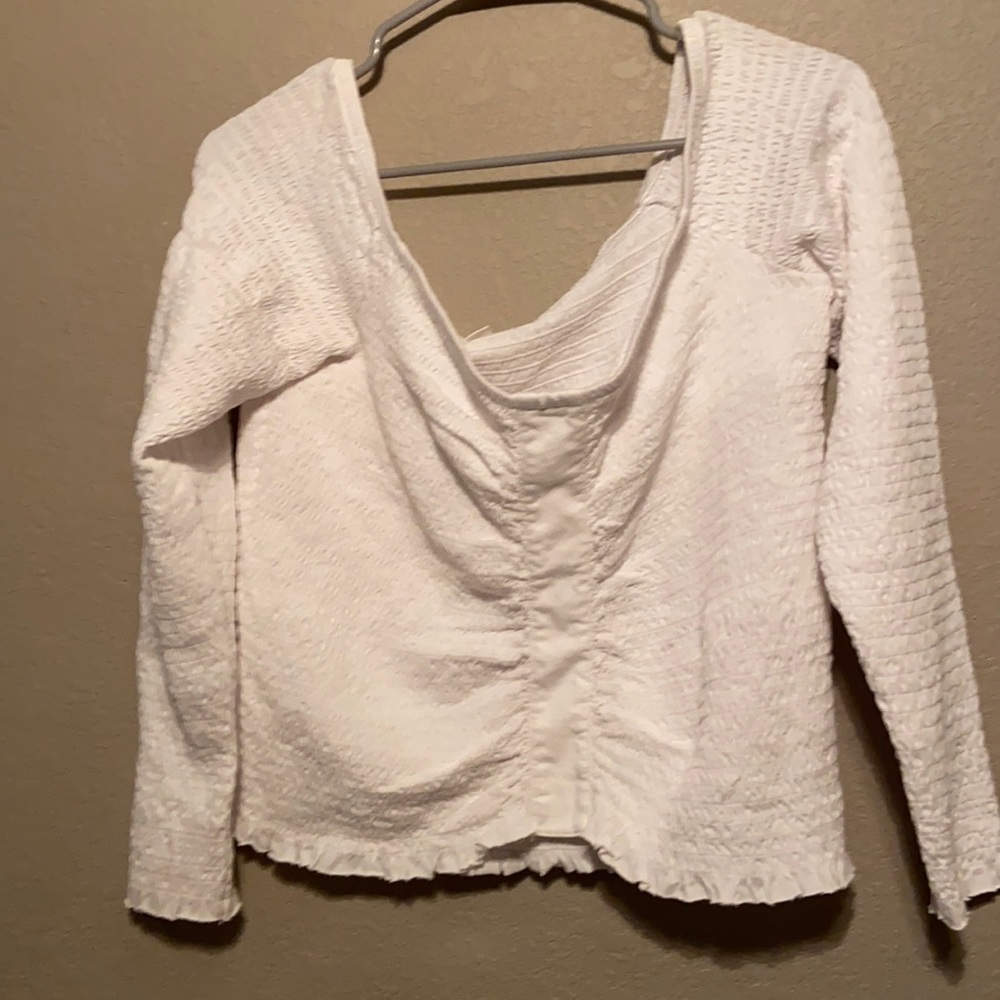 Actual large white off the shoulder shirt